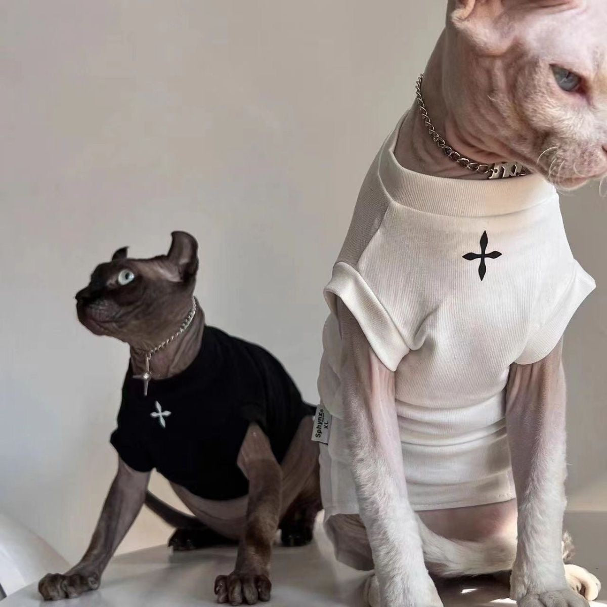C004-Cool Black Shirt for Cats with Cross Print Summer Wear for Devon Rex and Sphynx Pets Stylish Fashionable Design