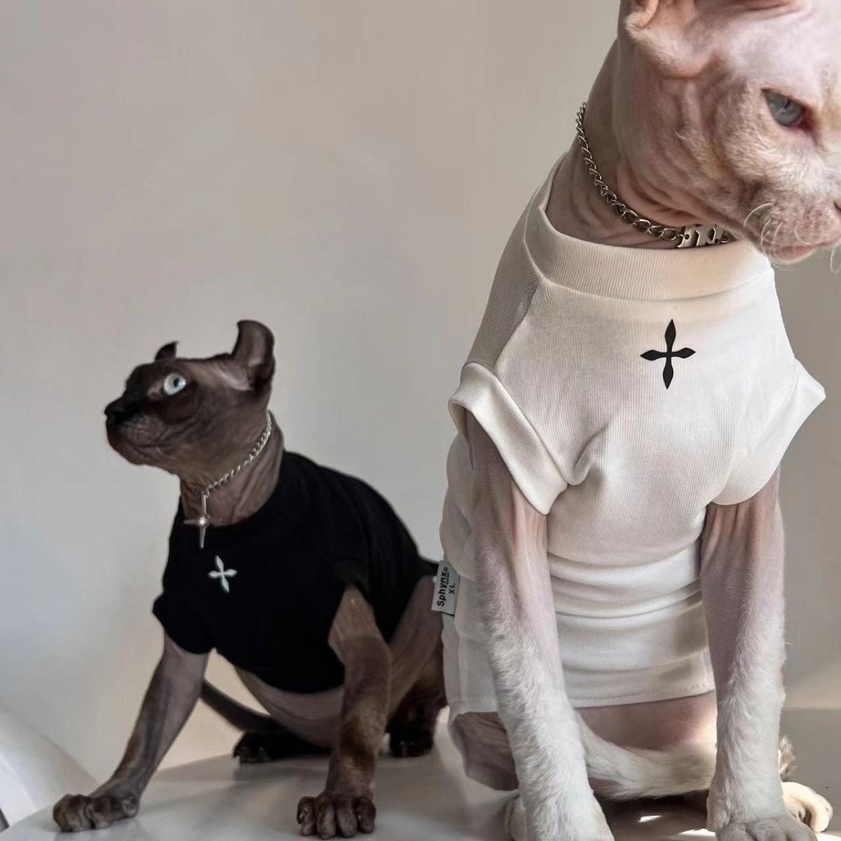C004-Cool Black Shirt for Cats with Cross Print Summer Wear for Devon Rex and Sphynx Pets Stylish Fashionable Design